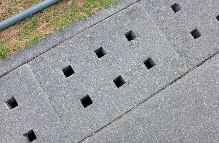 How To Disguise Drain Covers In Garden?
