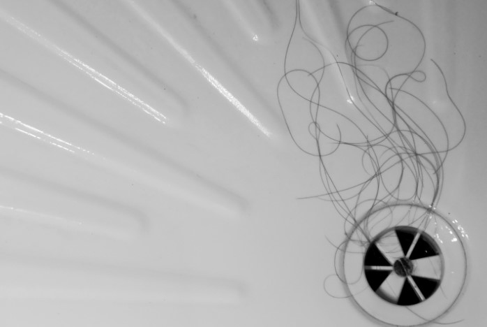 Remove visible debris and hair