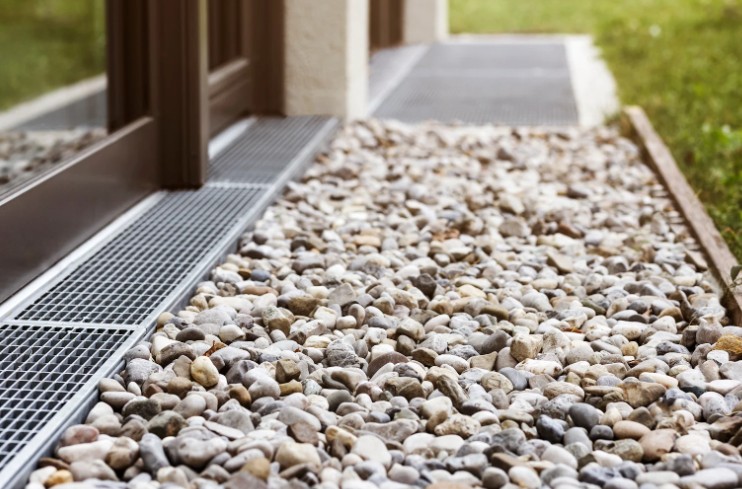 Installing drainage systems like French drains